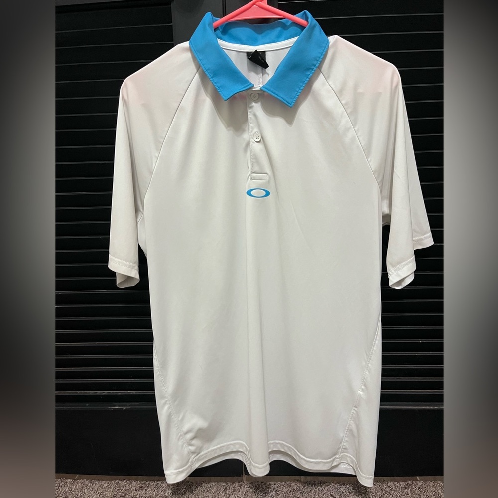 Oakley golf polo. Size medium. White & light blue